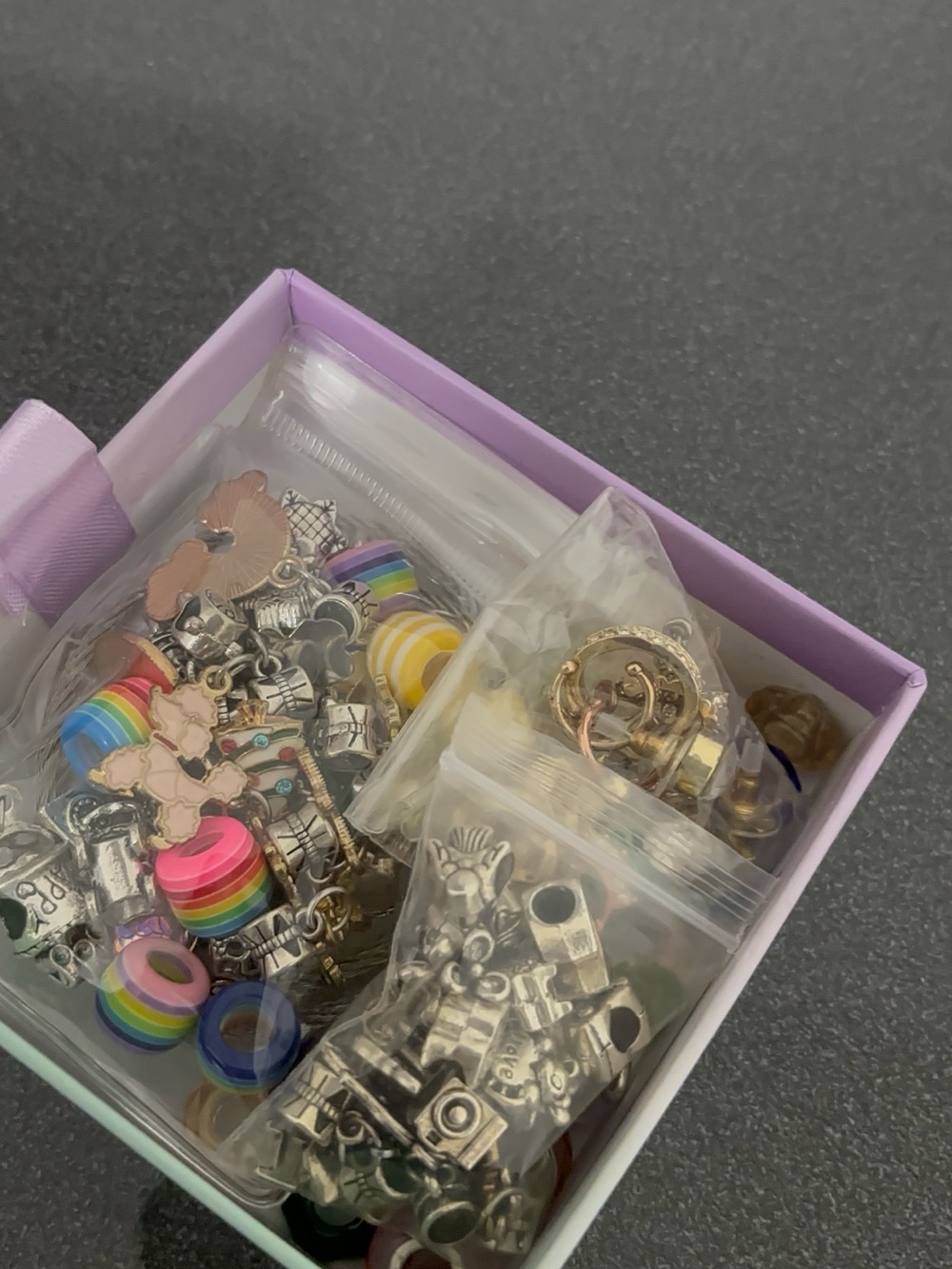 Charms for bracelets and jewelry pieces